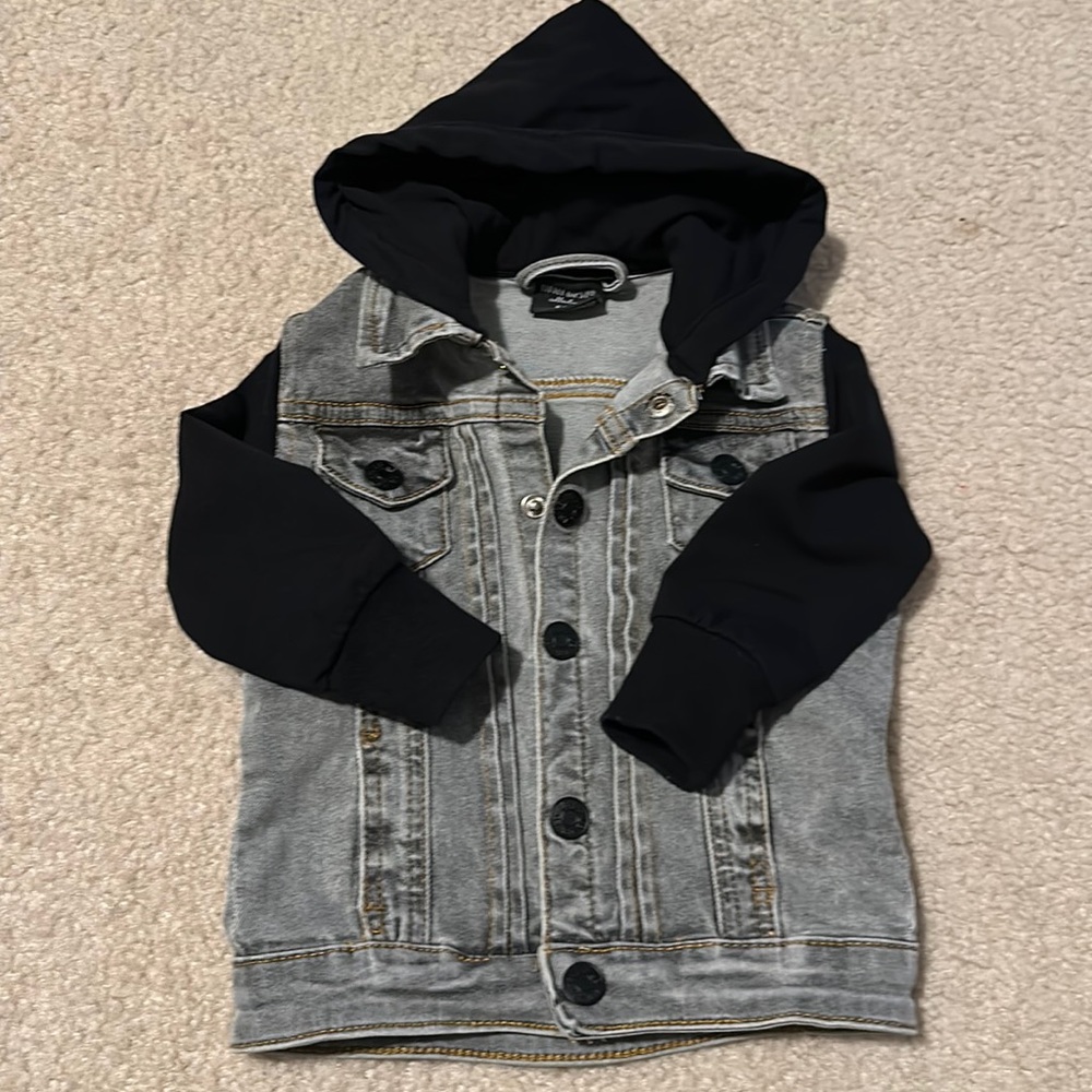 Little Bipsy Jean jacket 6-12 months. Grayish color with Black sleeves and hood.